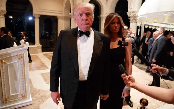 Donald and Melania Trump arrive at the party. Credit: AP